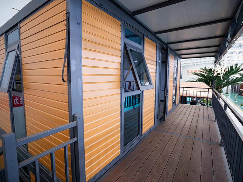 Casa modular expansível de dois lados com teto plano de dois níveis