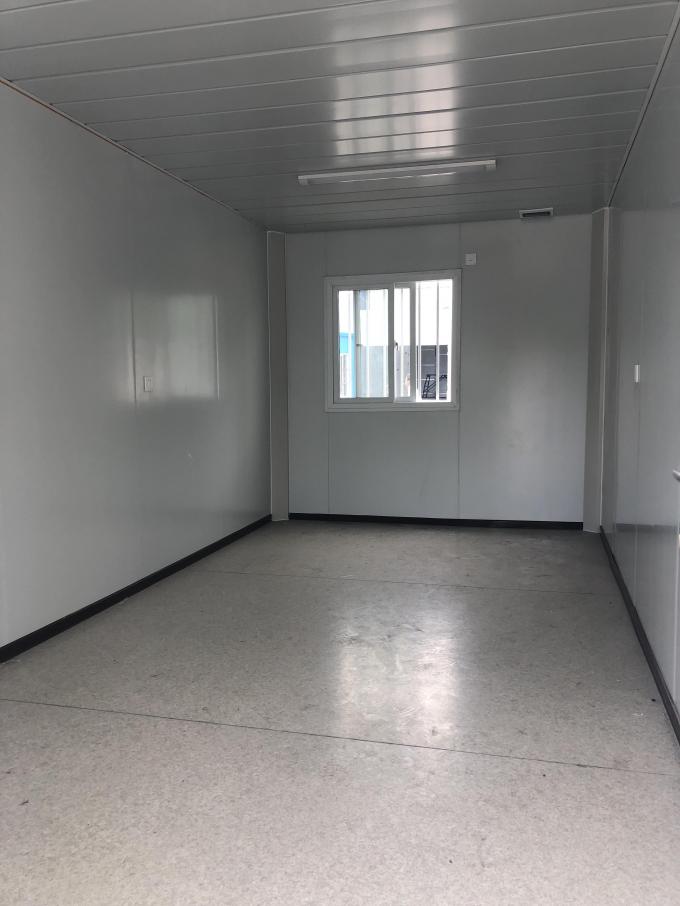 Série de casa de contêiner empacotada plana